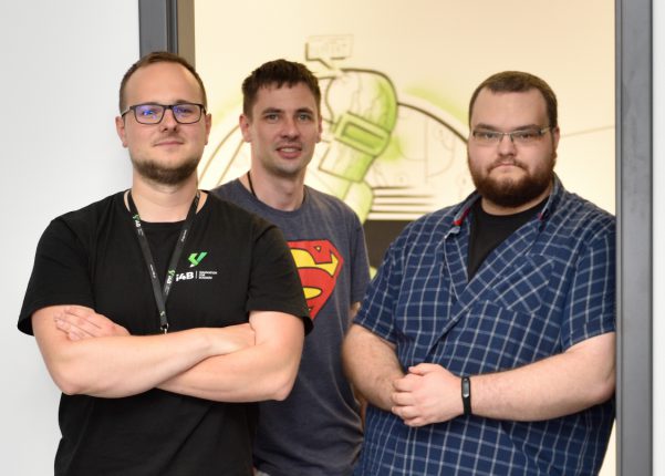 programming team posing for the camera job offer